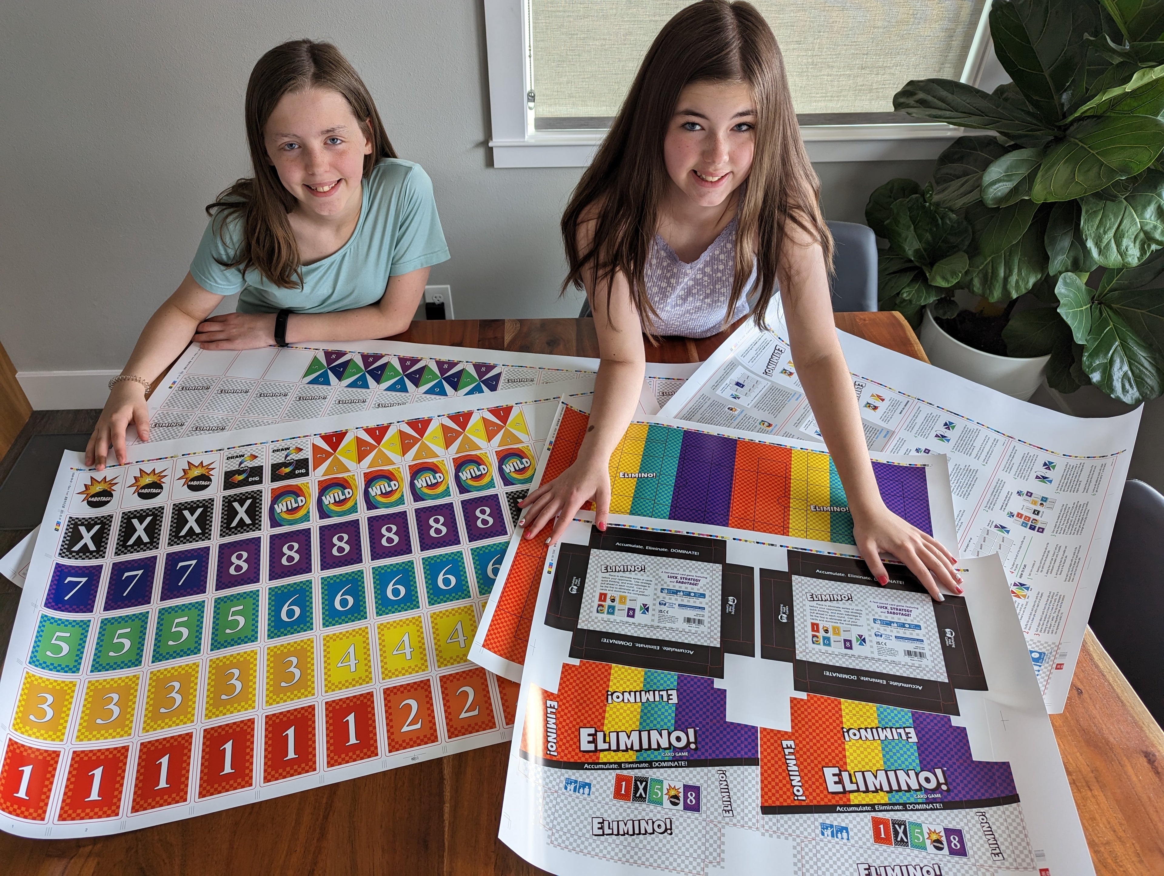 Two young girls with proofs for Elimino 